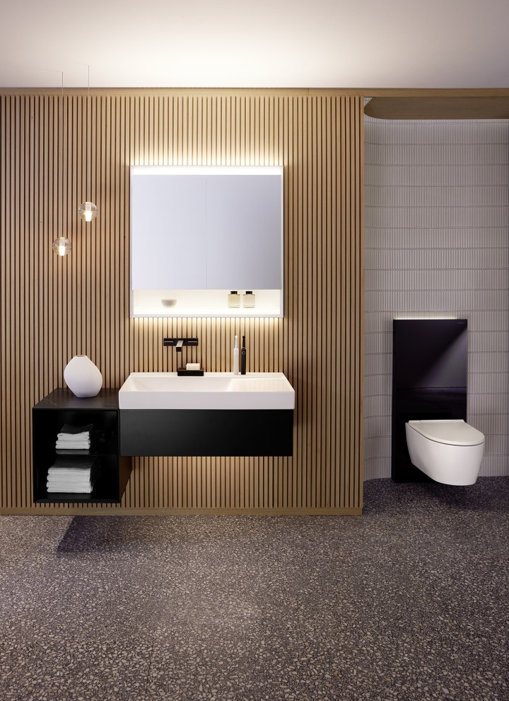 Lavabo individual Geberit ONE con muebles en negro (© Geberit)