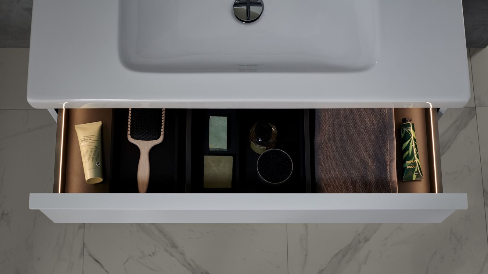 Cajón extensible Geberit iCon con barras de luz Cajón extensible Geberit iCon con barras de luz