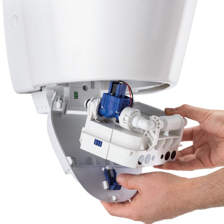 Unidad de control de urinario Geberit en una estación de acoplamiento Unidad de control de urinario Geberit en una estación de acoplamiento