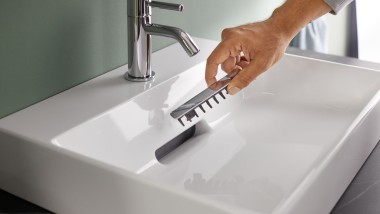 Tapa de desagüe con filtro anticabellos y fijación magnética lavabo Geberit ONE
