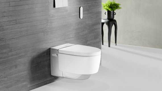 Geberit AquaClean Mera Comfort en cromado con mando a distancia