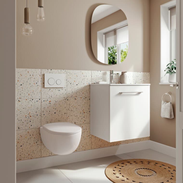 Cuarto de baño con inodoro, lavabo y mueble Geberit Selnova y pulsador Geberit Sigma20 Cuarto de baño con inodoro, lavabo y mueble Geberit Selnova y pulsador Geberit Sigma20